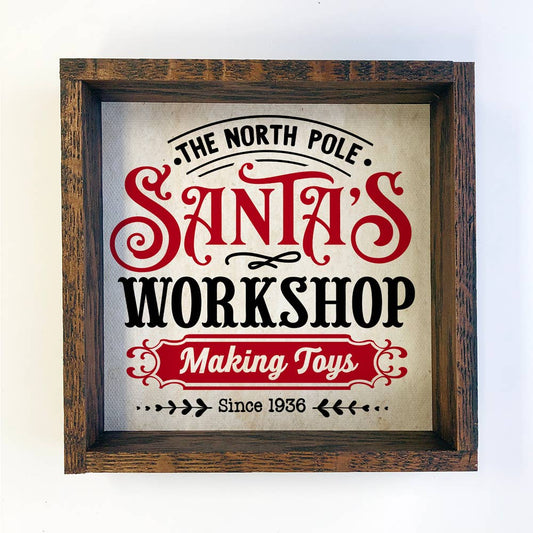 Santa's Workshop Red & Black - Cute Framed Holiday Word Sign: 11x11"